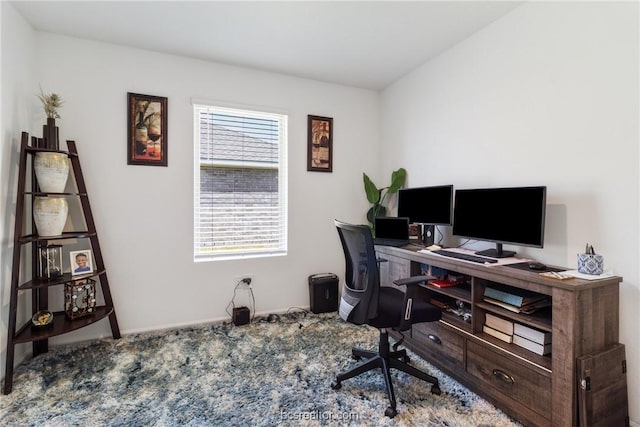 view of carpeted office space