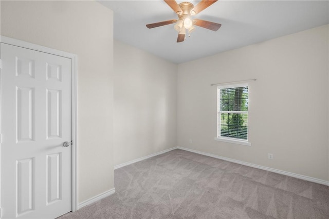 3500 Fazzino Ln, Bryan, TX 77807 - spare room with carpet floors, baseboards, and a ceiling fan