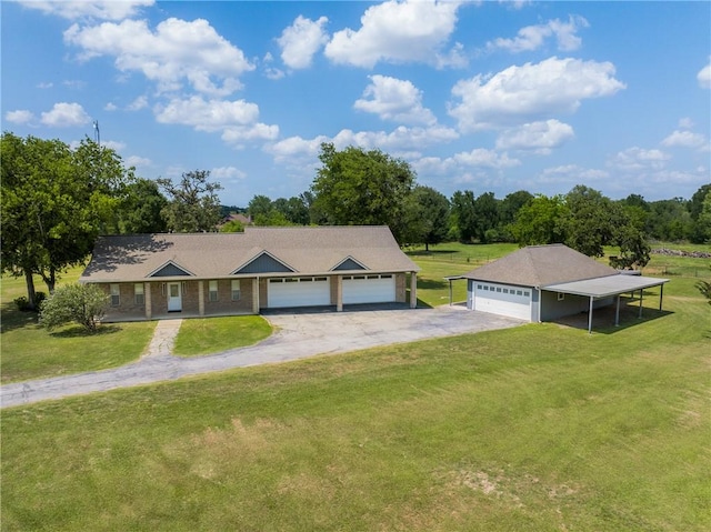 3500 Fazzino Ln, Bryan, TX 77807 - ranch-style home with driveway, a front yard, and a garage