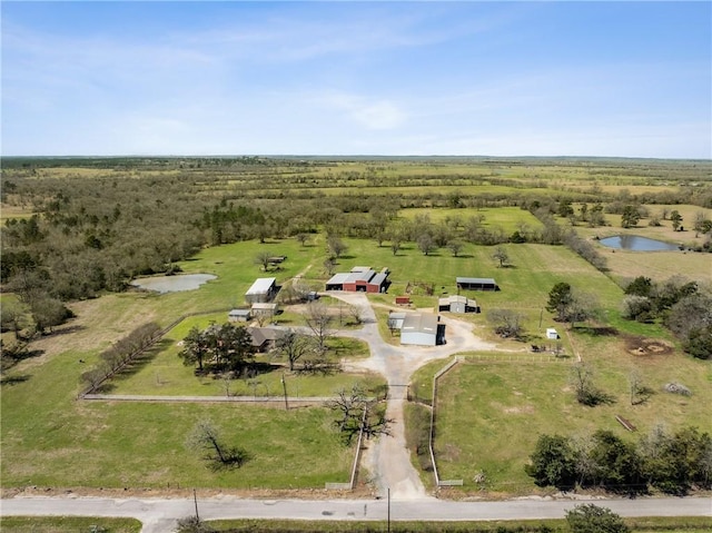 bird's eye view with a rural view and a water view