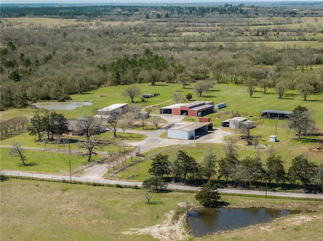 bird's eye view with a rural view and a water view