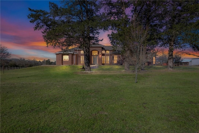 view of front facade with a front lawn