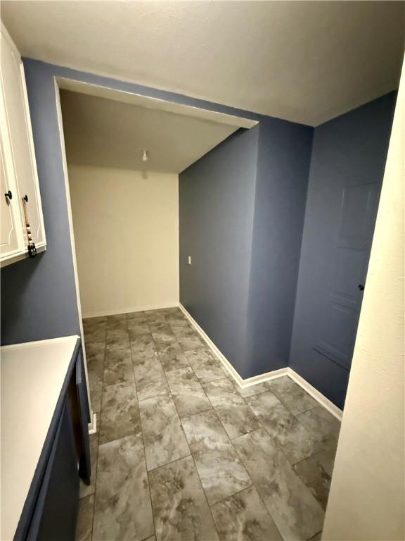 67 Fairway Dr, Hilltop Lakes, TX 77871 - empty room with baseboards