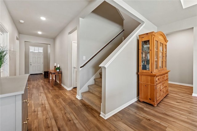 6317 Daytona Dr, College Station, TX 77845 - foyer featuring baseboards, recessed lighting, light wood-style floors, and stairway