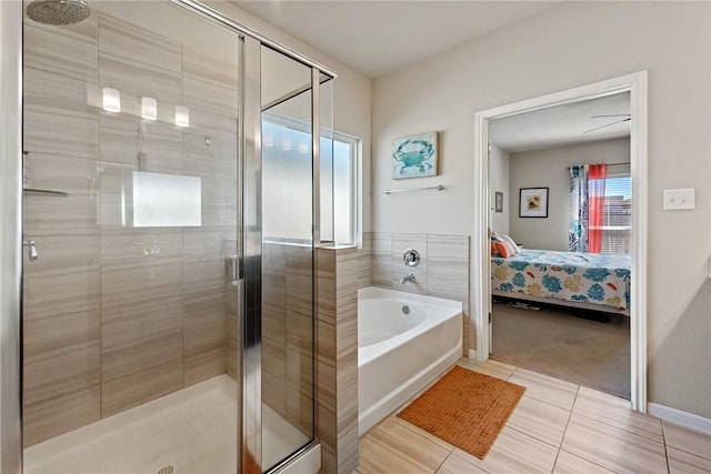 6317 Daytona Dr, College Station, TX 77845 - bathroom with connected bathroom, a bath, and a shower stall