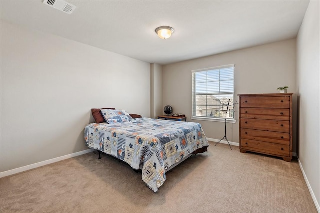 6317 Daytona Dr, College Station, TX 77845 - bedroom with light colored carpet, visible vents, and baseboards