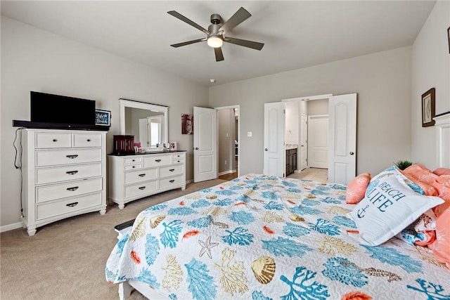 6317 Daytona Dr, College Station, TX 77845 - bedroom featuring light colored carpet, ensuite bath, baseboards, and a ceiling fan