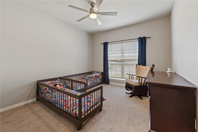 6317 Daytona Dr, College Station, TX 77845 - carpeted bedroom with baseboards and ceiling fan