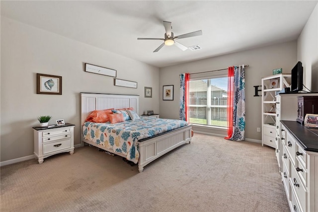 6317 Daytona Dr, College Station, TX 77845 - bedroom with baseboards, ceiling fan, visible vents, and light colored carpet