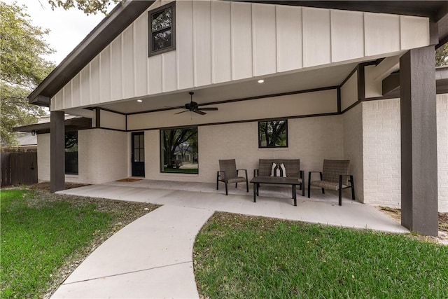 view of patio featuring ceiling fan