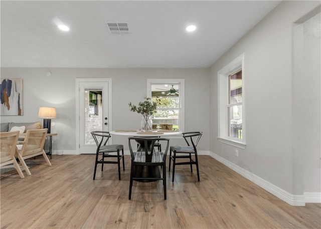 dining room featuring light hardwood / wood-style flooring