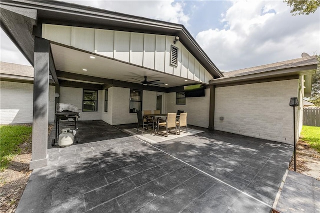 view of patio / terrace with ceiling fan and grilling area