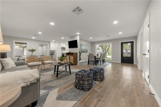 living room featuring light wood-type flooring