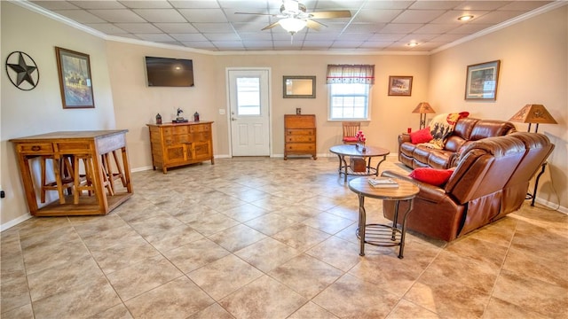 living room with crown molding, ceiling fan, and light tile patterned flooring