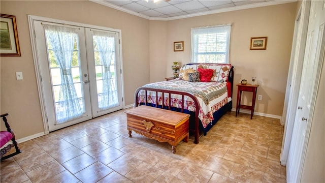 bedroom with access to exterior, ornamental molding, and french doors