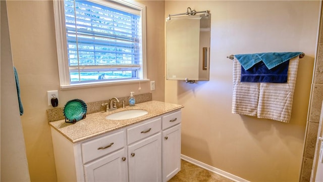 bathroom featuring vanity and tile patterned floors