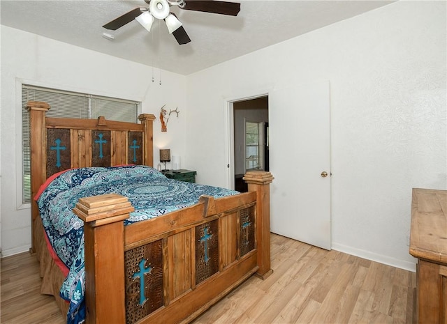 202 S Broadway St, Caldwell, TX 77836 - bedroom featuring light wood-style flooring and a ceiling fan