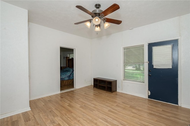 202 S Broadway St, Caldwell, TX 77836 - empty room with light wood-type flooring and a ceiling fan