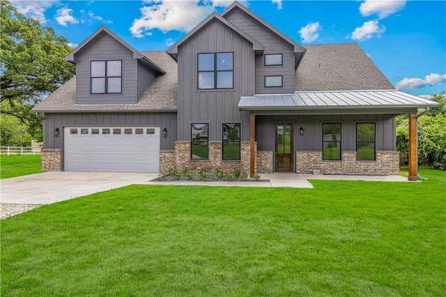 13291 Hopes Creek Rd, College Station, TX 77845 - view of front of house with a shingled roof, board and batten siding, concrete driveway, and brick siding