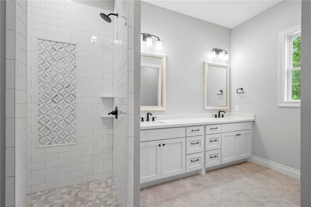 13291 Hopes Creek Rd, College Station, TX 77845 - full bath with walk in shower, double vanity, baseboards, and tile patterned floors