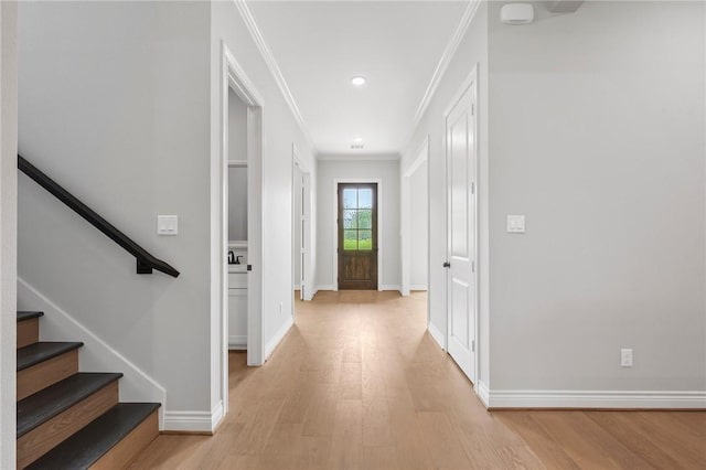 13291 Hopes Creek Rd, College Station, TX 77845 - entrance foyer with light wood-style flooring, crown molding, baseboards, stairway, and recessed lighting