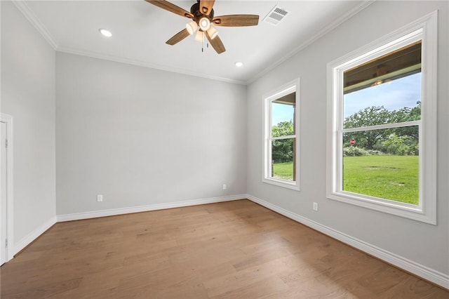 13291 Hopes Creek Rd, College Station, TX 77845 - empty room featuring crown molding, light wood-type flooring, baseboards, ceiling fan, and recessed lighting