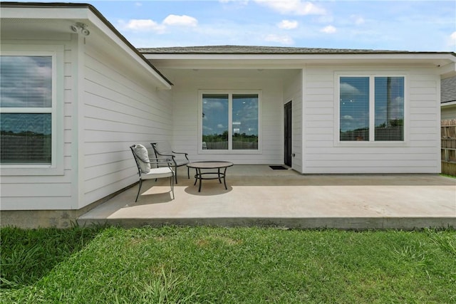 3448 Pointe Du Hoc Dr, Bryan, TX 77808 - back of property featuring a patio area