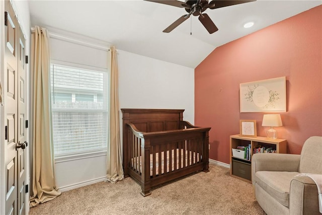 3448 Pointe Du Hoc Dr, Bryan, TX 77808 - bedroom featuring lofted ceiling, a nursery area, light carpet, and ceiling fan