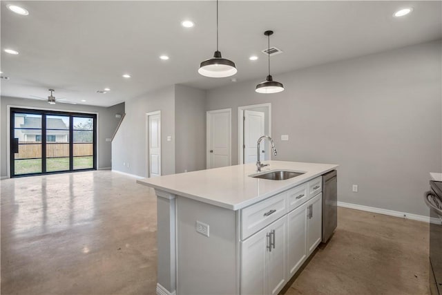 kitchen with sink, stainless steel dishwasher, pendant lighting, a kitchen island with sink, and white cabinets