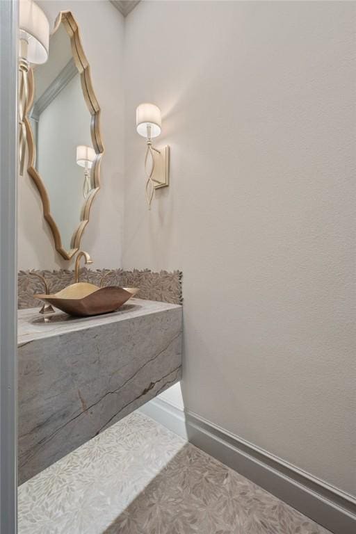 bathroom with tile patterned flooring