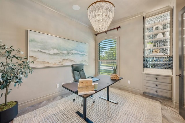 home office with a notable chandelier, crown molding, and light hardwood / wood-style flooring