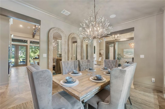 dining room with french doors, an inviting chandelier, and ornamental molding