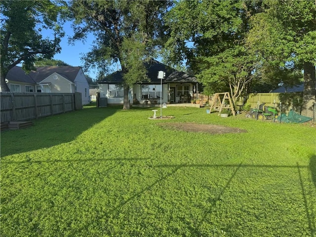202 N Hearne St, Franklin, TX 77856 - view of yard featuring a patio area and a fenced backyard