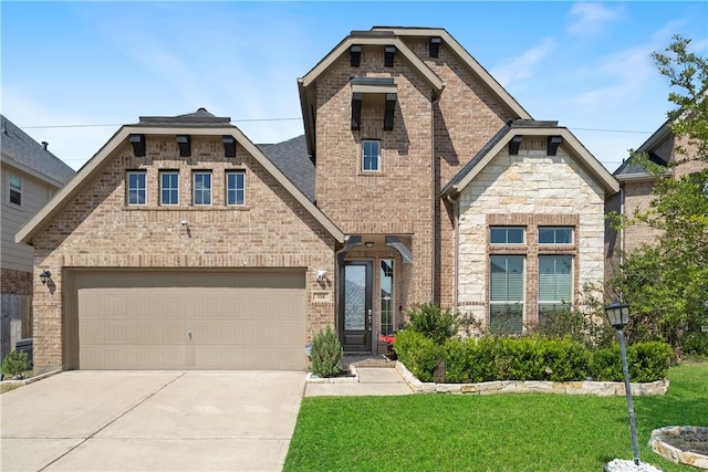 view of front facade featuring a garage and a front lawn