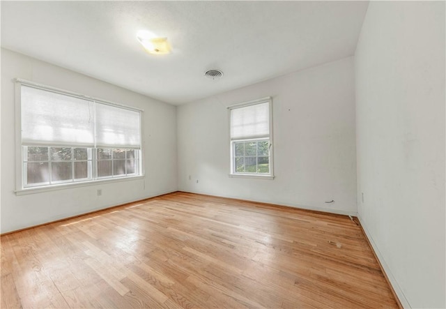 1500 Galde St, College Station, TX 77840 - empty room with light wood-style flooring