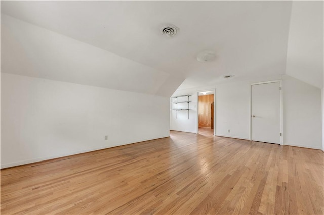 1500 Galde St, College Station, TX 77840 - additional living space with vaulted ceiling and light wood-style flooring