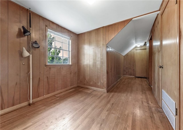 1500 Galde St, College Station, TX 77840 - additional living space with hardwood / wood-style flooring and wooden walls