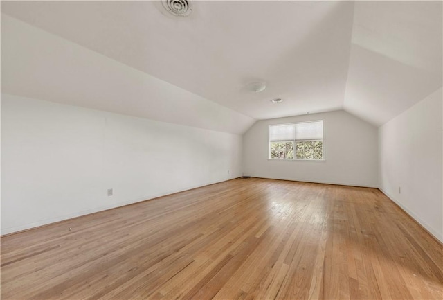 1500 Galde St, College Station, TX 77840 - additional living space featuring lofted ceiling and light wood-style flooring