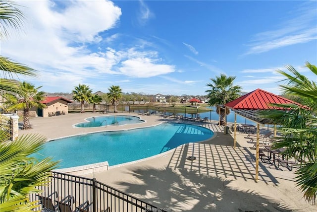 pool featuring a patio, a gazebo, fence, and a jacuzzi