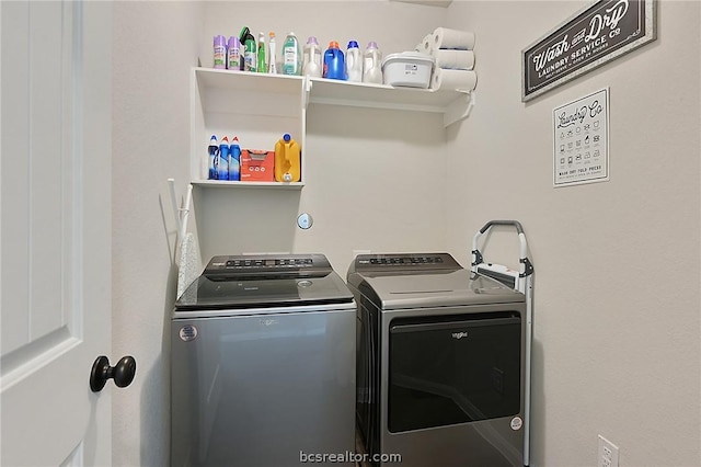 laundry room featuring washing machine and dryer