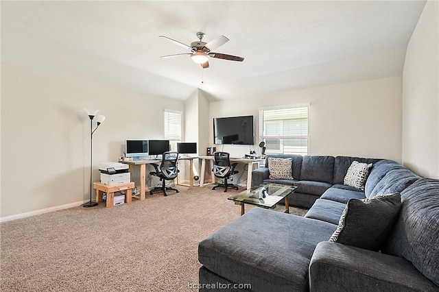 carpeted living room featuring ceiling fan and lofted ceiling