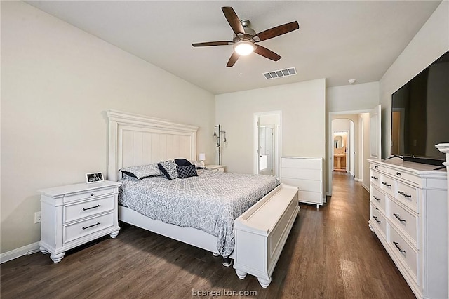 bedroom with ceiling fan and dark hardwood / wood-style floors