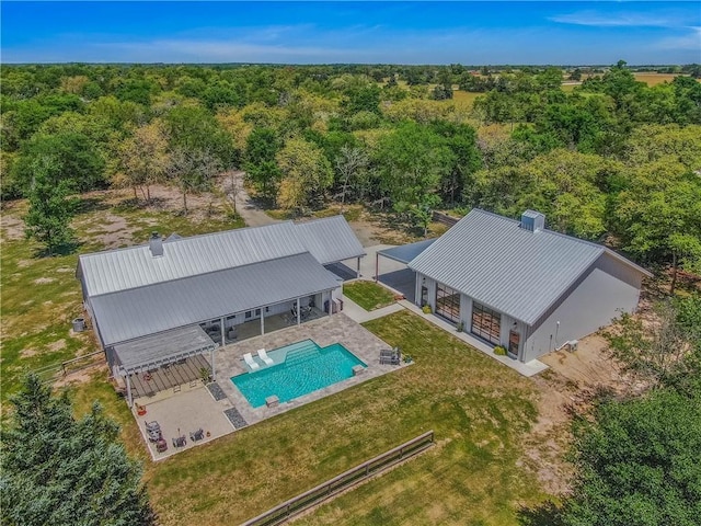 aerial view with a wooded view