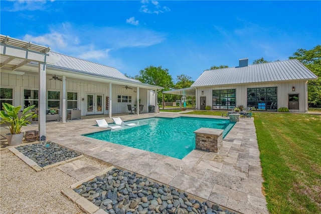 pool featuring ceiling fan, a pergola, a patio, french doors, and a lawn