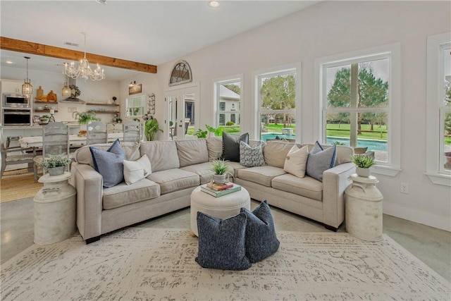 living area featuring recessed lighting, baseboards, beam ceiling, and a chandelier
