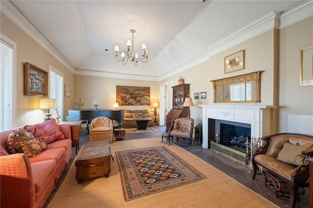 living room with a fireplace with flush hearth, a notable chandelier, and crown molding