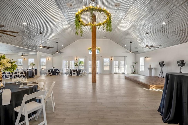 6191 Bethel Cemetery Rd, North Zulch, TX 77872 - misc room with high vaulted ceiling, ceiling fan, and light wood-style floors