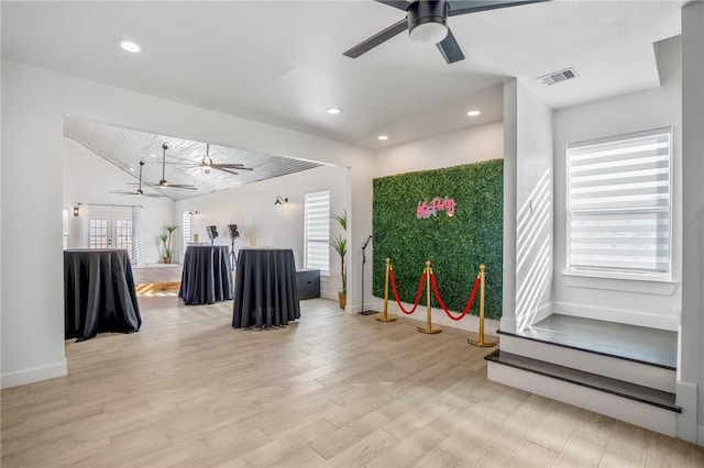 6191 Bethel Cemetery Rd, North Zulch, TX 77872 - unfurnished living room with ceiling fan, baseboards, light wood finished floors, recessed lighting, and vaulted ceiling