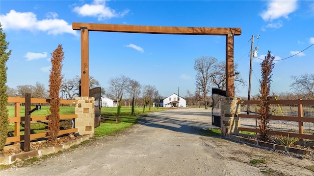 6191 Bethel Cemetery Rd, North Zulch, TX 77872 - view of dirt / gravel road with a gated entry and a gate