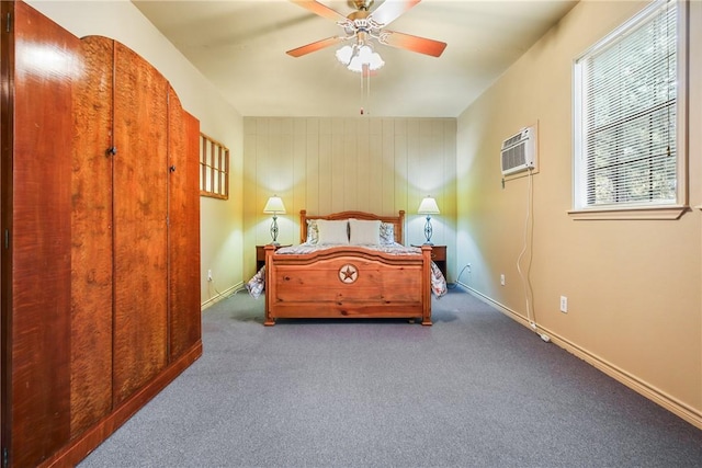 bedroom featuring dark colored carpet, a closet, and ceiling fan